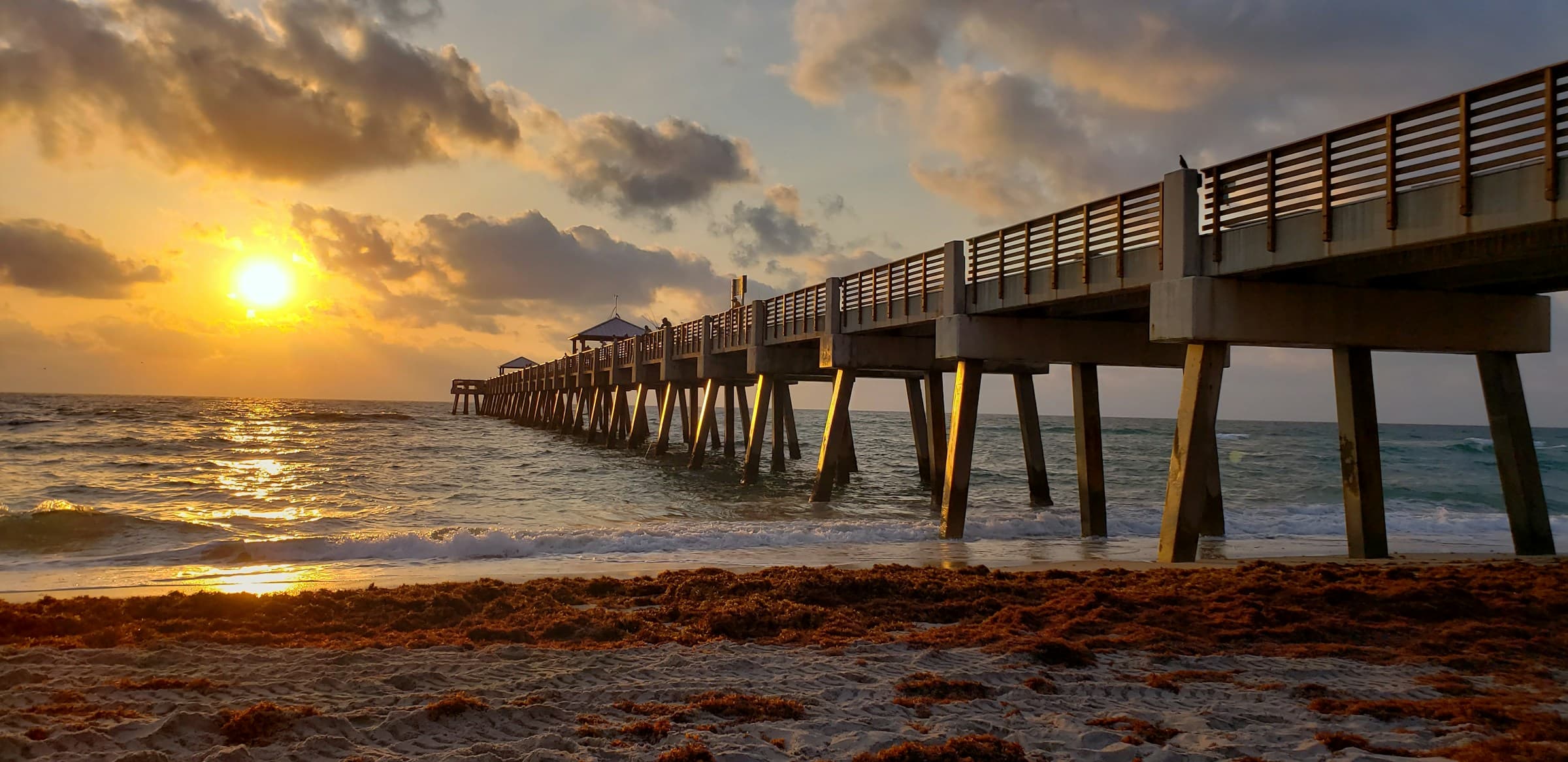 Juno Beach Pier at golden hour