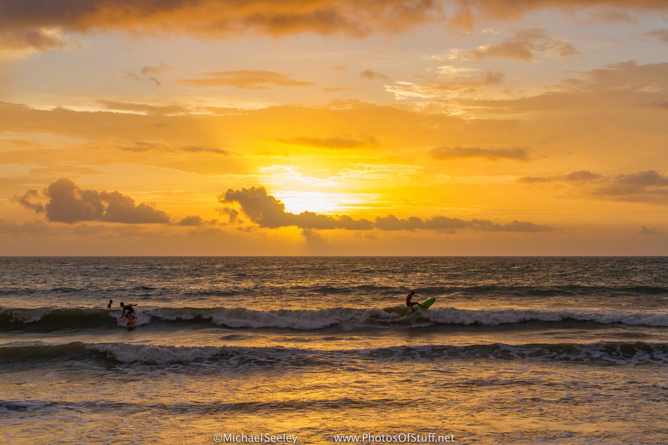 Surfers at Florida sunrise